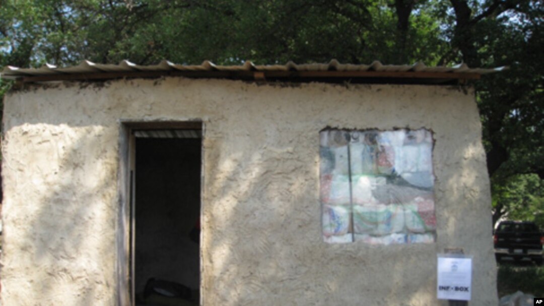 Mud hut built out of plastic bag bricks
