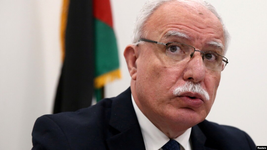 FILE - Palestinian Foreign Minister Riyad al-Maliki holds a news conference at the International Criminal Court in The Hague, Netherlands, May 22, 2018.