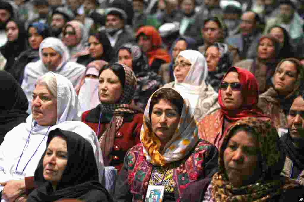 Members of the Afghan Loya Jirga attend a meeting in Kabul, Nov. 21, 2013.