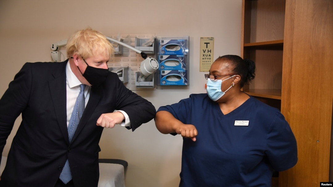 Britain's Prime Minister Boris Johnson visits the Tollgate Medical Centre in Beckton, London, Britain July 24, 2020.