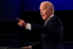 Democratic presidential candidate former Vice President Joe Biden gestures while speaking during the first presidential debate, Sept. 29, 2020, in Cleveland, Ohio.