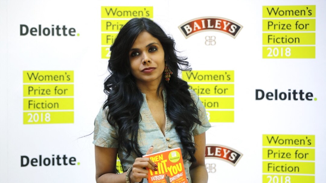 FILE - India's Meena Kandasamy, one of the shortlisted authors for the Women's Prize for Fiction poses in London, June 6, 2018.