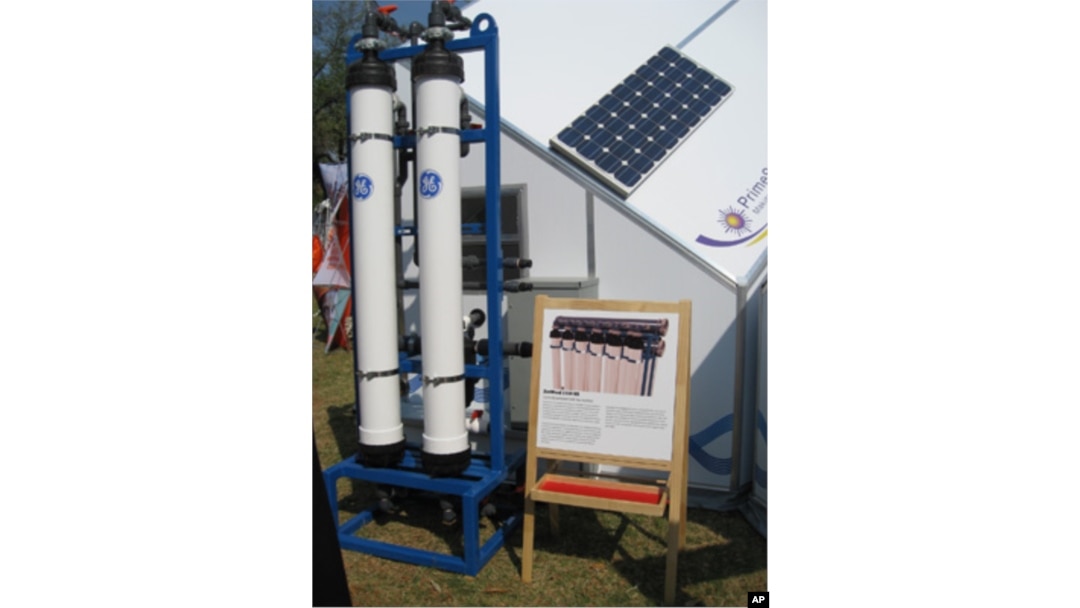 Solar panel and GE water purifier on the HabiHut shelter roof