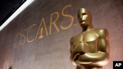 FILE - A giant Oscar statuette at the 88th Academy Awards Nominees Luncheon in Beverly Hills, Calif. 