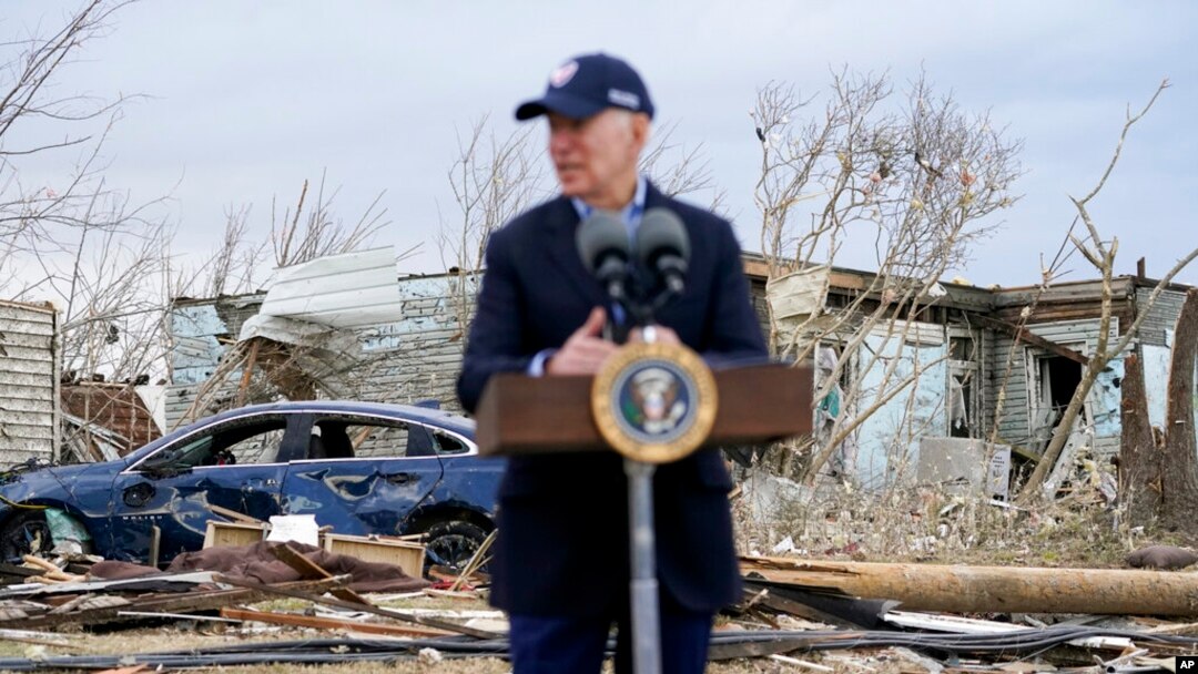 President Joe Biden speaks after surveying storm damage from tornadoes and extreme weather in Dawson Springs, Ky., Dec. 15, 2021.