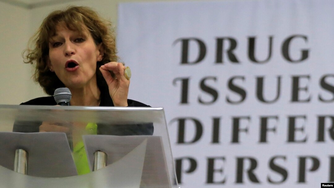 FILE - Agnes Callamard, a United Nations Special Rapporteur on extrajudicial, summary or arbitrary executions, delicers a statement during a "Drug issues, Different Perspectives" forum at a compound of University of the Philippines in Quezon city, metro Manila.