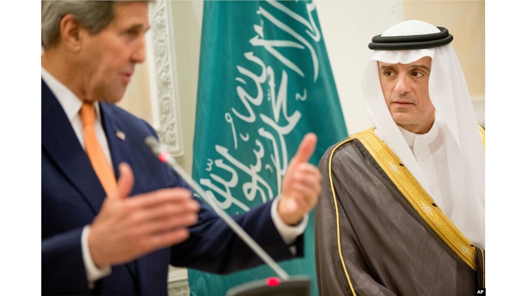 U.S. Secretary of State John Kerry, left, and Saudi Foreign Minister Adel al-Jubeir, right, hold a joint news conference at Riyadh Air Base in Saudi Arabia, Thursday, May 7, 2015.