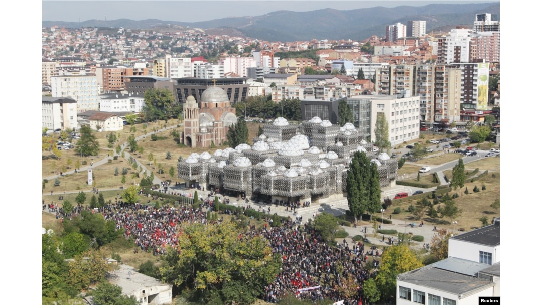 People protest against Kosovo President Hashim Thaci's border change proposal deal with Serbia in Pristina, Kosovo, Sept. 29, 2018.