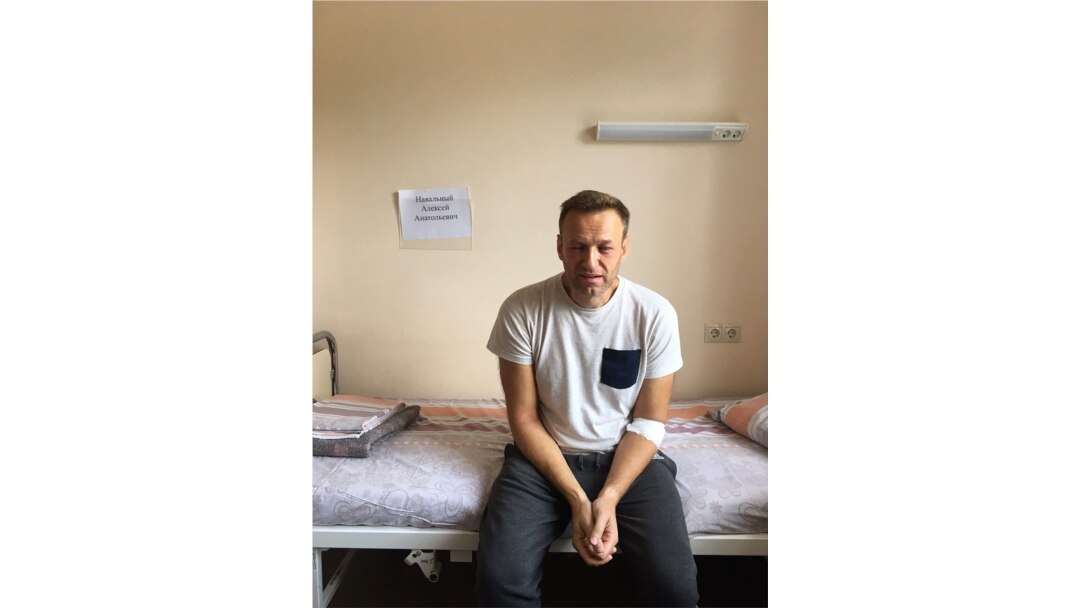 A handout image made available on the official website of Russia's opposition leader Alexei Navalny (Navalny.com) on July 29, 2019, shows Russia's jailed opposition leader Alexei Navalny sitting on a hospital bed in Moscow.
