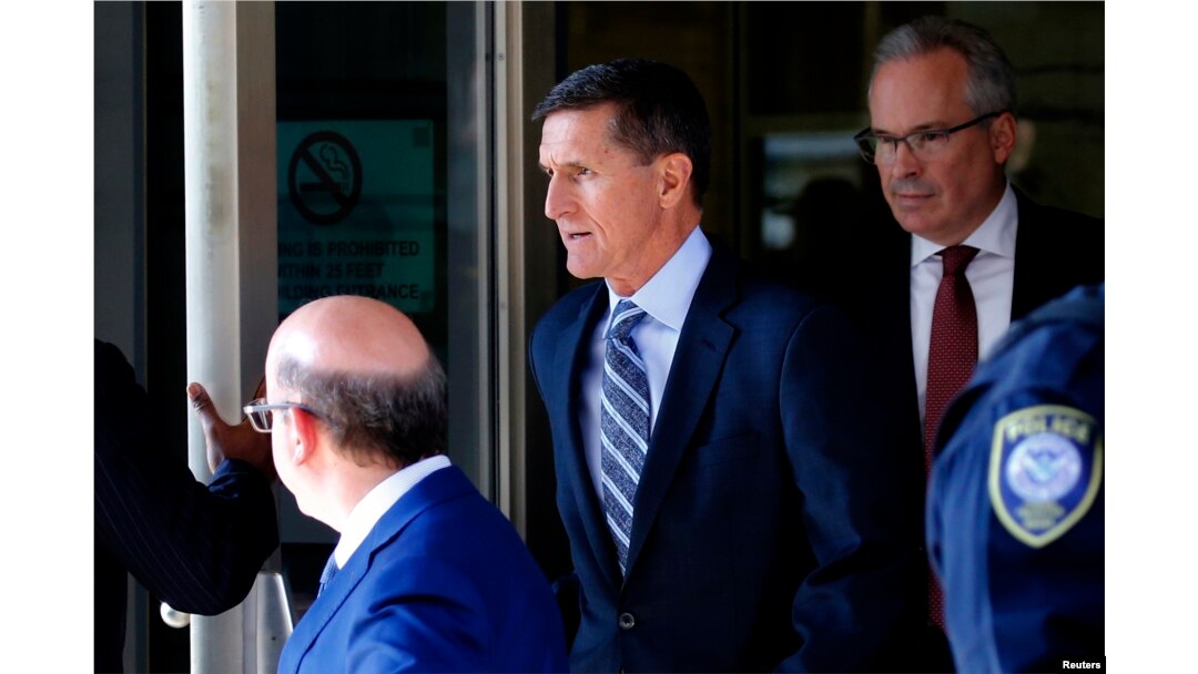 Former U.S. National Security Adviser Michael Flynn departs U.S. District Court, where he was expected to plead guilty to lying to the FBI about his contacts with Russia's ambassador to the United States, in Washington, Dec. 1, 2017.