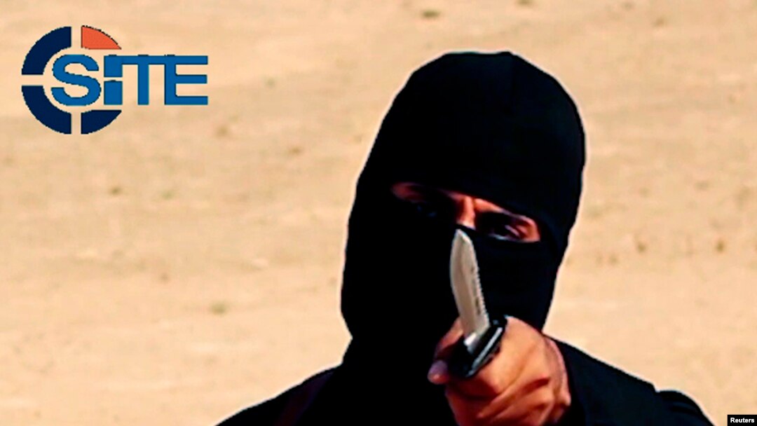 FILE - "Jihadi John," a militant who has been identified by the Washington Post newspaper as a Briton named Mohammed Emwazi, brandishes a knife in this still image from a 2014 video obtained from SITE Intel Group.