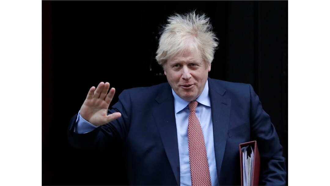 Britain's Prime Minister Boris Johnson leaves 10 Downing Street to attend the weekly session of Prime Ministers Questions in Parliament in London, Jan. 29, 2020.