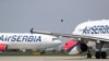 Arhiva - Avioni Er Srbije na aerodromu Nikola Tesla, u Beogradu, 25. aprila 2020.