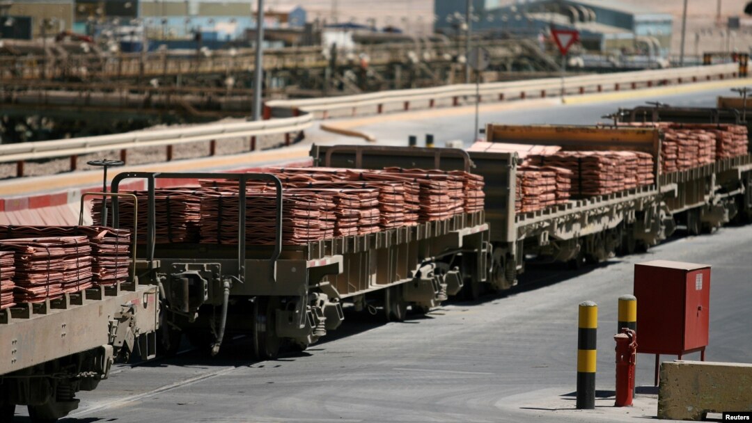 FILE - A train loaded with sheets of copper cathode at the copper cathode plant, is seen at BHP Billiton's Escondida, the world's biggest copper mine, in Antofagasta, northern Chile.