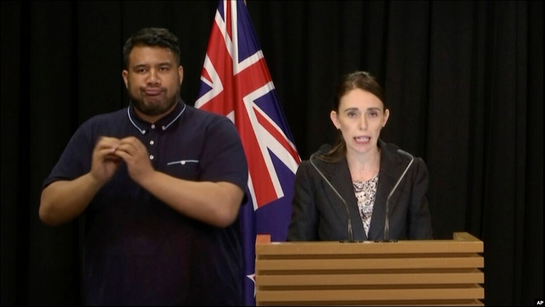 In this image made from video, New Zealand's Prime Minister Jacinda Ardern, right, speaks during a press conference in Wellington, Thursday, March 21, 2019.