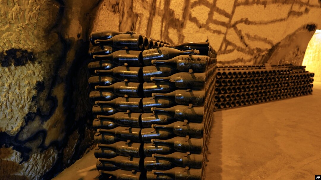 Champagne bottles piled in the cave of the Vranken-Pommery Monopole in Reims, east of Paris, July 28, 2020. Producers in France say they’ve lost about 1.7 billion euros ($2 billion) in sales this year.