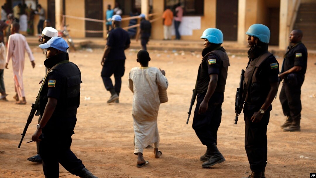 FILE - U.N. peacekeepers are seen on patrol in Bangui, capital of the Central African Republic, Feb. 14, 2016. The U.N. announced Wednesday that the Congo Republic will withdraw its troops from a peacekeeping mission in CAR amid sexual abuse allegations against its troops.