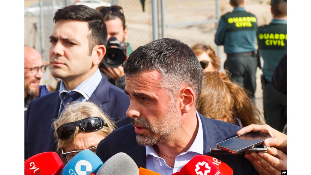 Santi Vila, Catalonia's regional chief for business, talks to journalists as he leaves the Estremera prison in Madrid, Nov. 3, 2017. He was the lone former member of the Catalan government to be released on bail Friday.