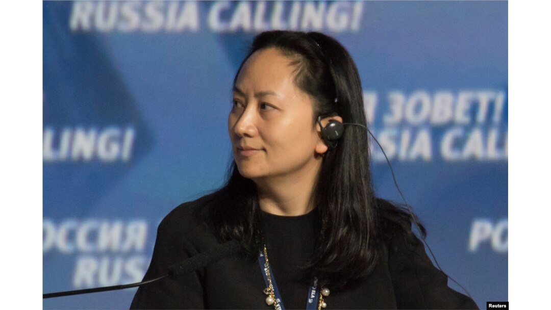 FILE - Meng Wanzhou, Executive Board Director of the Chinese technology giant Huawei, attends a session of the VTB Capital Investment Forum "Russia Calling!" in Moscow, Oct. 2, 2014.
