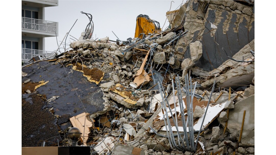 FILE - The rubble of the collapsed building Champlain tower is seen in Surfside, Florida, July 6, 2021.