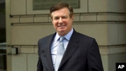 FILE - Paul Manafort, President Donald Trump's former campaign chairman, leaves U.S. District Court after a hearing in Washington, May 23, 2018.