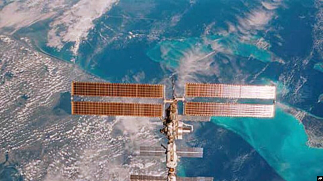 The International Space Station is seen over Miami, Florida, in this 35mm frame photographed by STS-108 Commander DomInic Gorie aboard the Space Shuttle Endeavour (file photo)