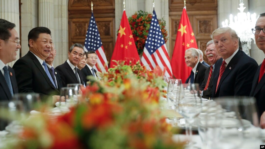 President Donald Trump and China's President Xi Jinping lead their respective delegatiosn during their bilateral meeting at the G-20 Summit, Dec. 1, 2018, in Buenos Aires, Argentina.