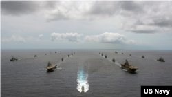 潛艇開路 環太多國聯合軍演2020年8月21日在夏威夷州外海舉行編隊航行（美國海軍照片）