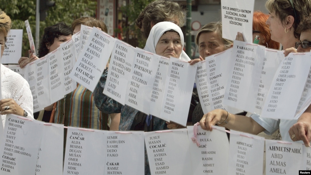 FILE - Bosnian Muslim women from Visegrad hold a peaceful protest of the U.N. war crimes tribunal's failure to include counts of rape in indictments against Bosnian Serb cousins Milan and Sredoje Lukic, Sarajevo, July 18, 2008.