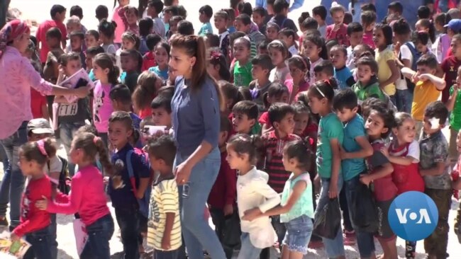 Kurdish Refugee Children Head Back to School in a Tent 