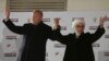 Turkey's President and ruling Justice and Development Party, or AKP, leader Recep Tayyip Erdogan, left, and his wife Emine, greet supporters after the results of the local elections were announced in Ankara, Turkey, early Monday, April 1, 2019.