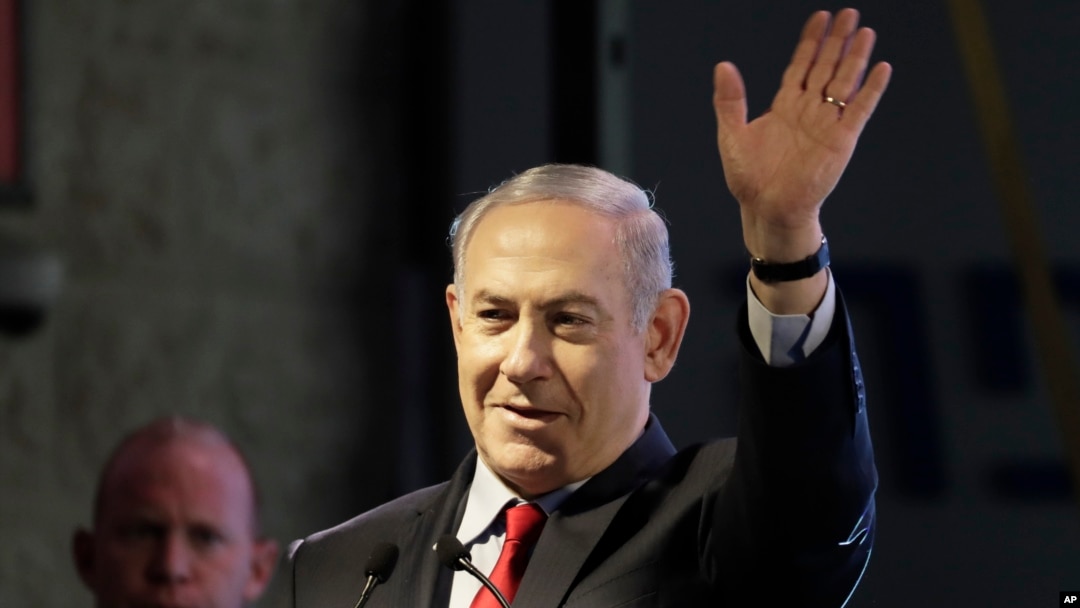 Israeli Prime Minister Benjamin Netanyahu waves during the opening ceremony for a bomb-proof emergency room in a hospital in Ashkelon, Israel, Feb. 20, 2018.
