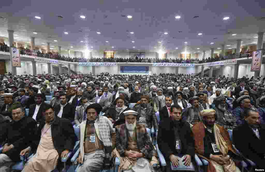Members of the Afghan Loya Jirga attend a gathering in Kabul, Nov. 21, 2013.