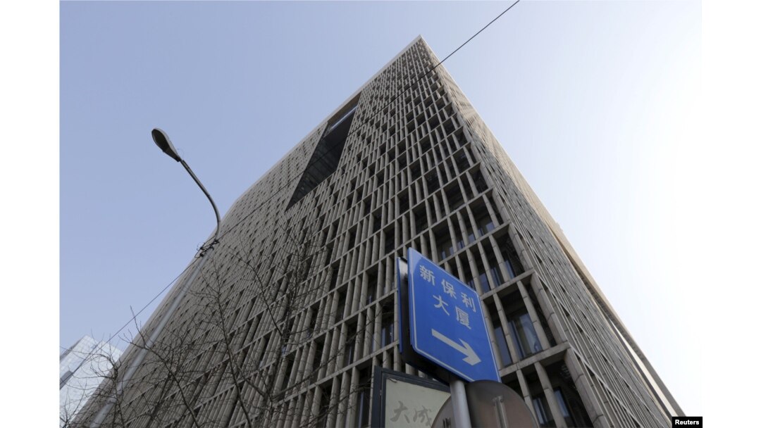 FILE - The headquarters building of the China Investment Corporation is pictured in Beijing. Australia's Asciano Ltd., a port and rail giant, this week agreed to $6.8 billion buyout by two global consortia; CIC is a participant in the deal.