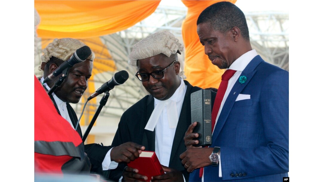 The Patriotic Front's Edgar Lungu, right, is sworn in as president at an inauguration ceremony in Lusaka, Jan. 25, 2015.
