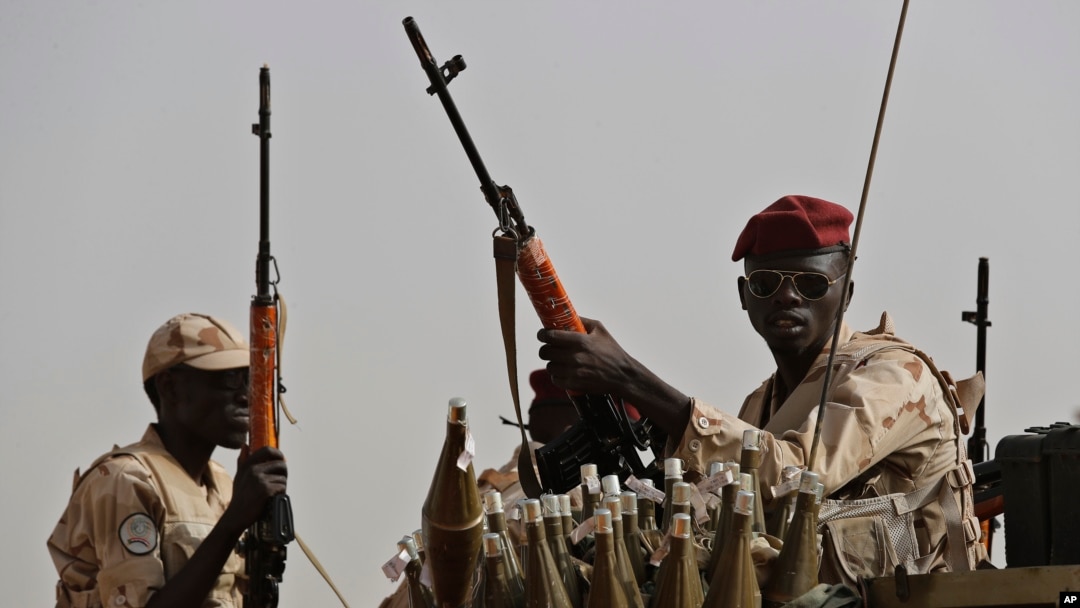 FILE - Sudanese soldiers from the Rapid Support Forces unit, led by Gen. Mohammed Hamdan Dagalo, the deputy head of the military council, secure the area in the East Nile province, Sudan, June 22, 2019. 