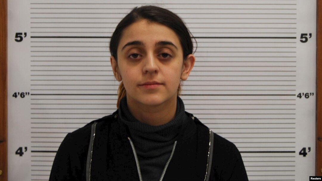 Tareena Shakil is seen after her arrest, in this undated booking picture courtesy of West Midlands Police. 