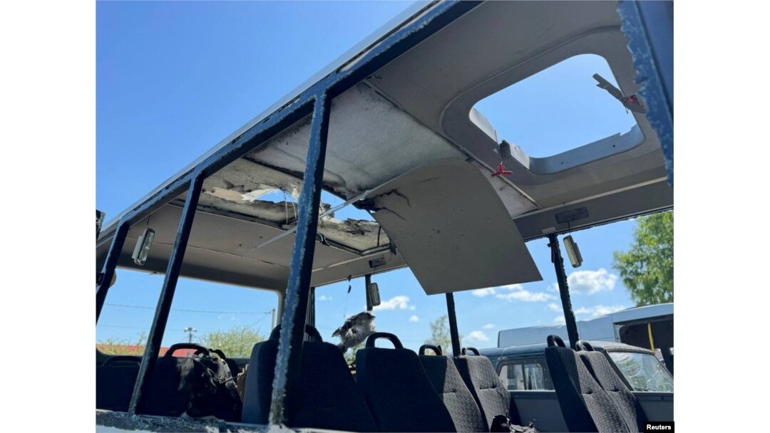 A photo provided by the governor's office of Russia's Belgorod region shows a bus that local authorities say was damaged in a Ukrainian drone attack as it was taking people to work near the village of Berezovka, May 6, 2024.