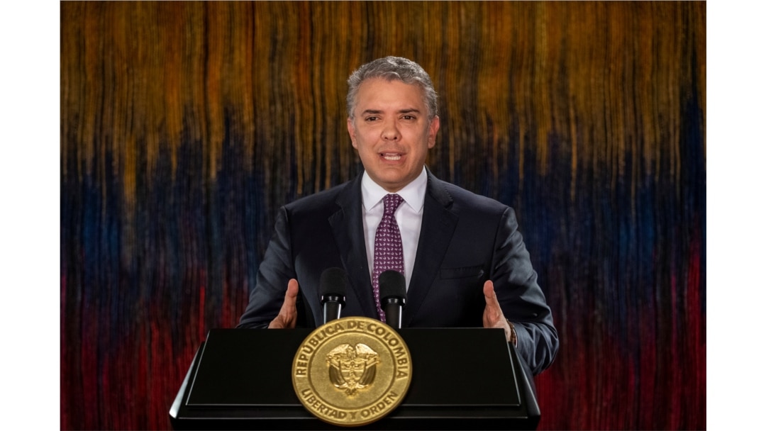 FILE - Colombia's President Ivan Duque addresses the nation in a televised speech, in Bogota, Colombia, Nov. 22, 2019.