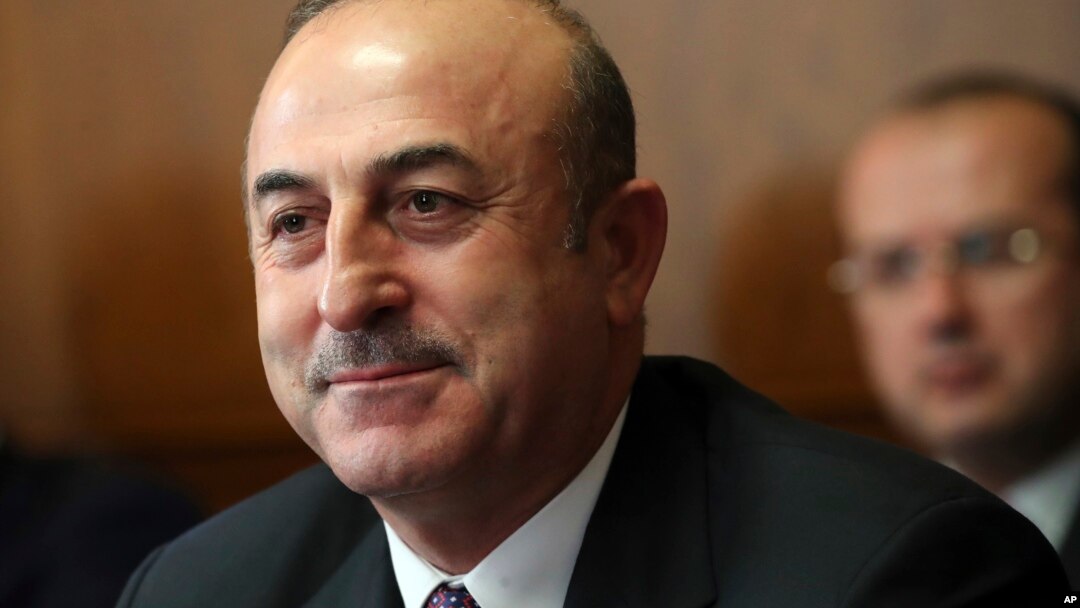 FILE - Turkish Foreign Minister Mevlut Cavusoglu attends a meeting on forming a constitutional committee in Syria at the European headquarters of the United Nations in Geneva, Switzerland, Dec. 18, 2018. 