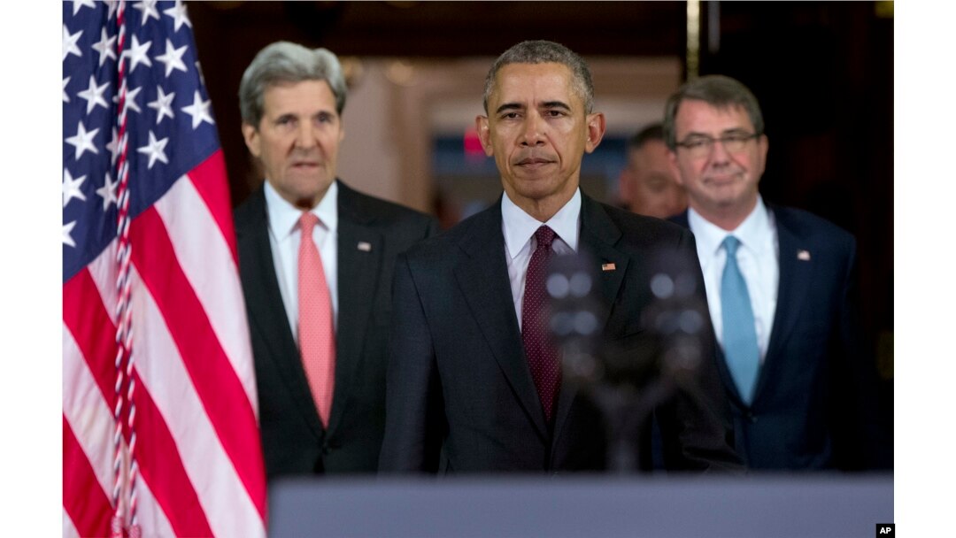 President Barack Obama, center, followed by Secretary of State John Kerry, left, and Defense Secretary Ash Carter right, walks to a podium to speak to media after a meeting of his National Security Council (NSC) at the State Department in Washington, Feb.