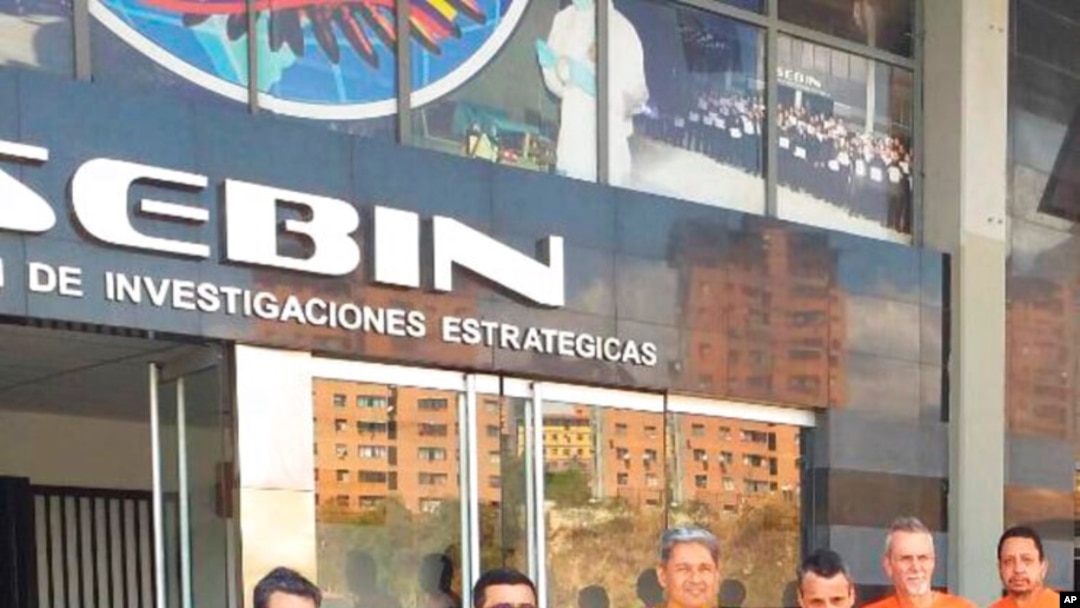 FILE - This undated photo posted on Twitter on June 18, 2020, by Venezuela's foreign minister shows, from left, CITGO executives Jose Angel Pereira, Gustavo Cardenas, Jorge Toledo, Jose Luis Zambrano, Tomeu Vadell and Alirio Jose Zambrano in Caracas.