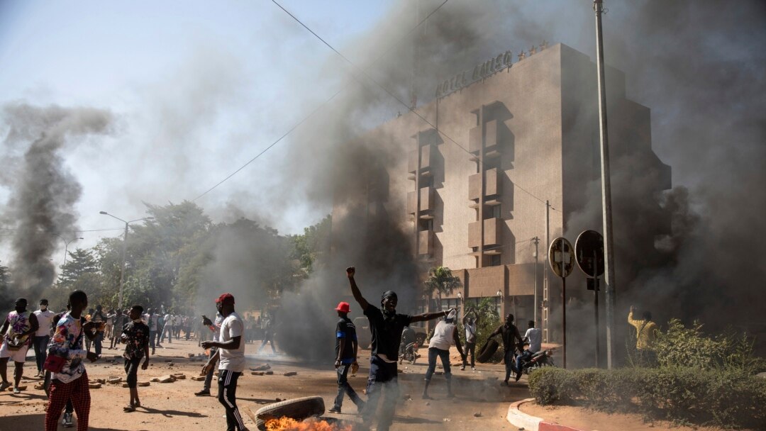 Protestors take to the streets of Burkina Faso's capital Ouagadougou on Nov. 27, 2021, calling for President Roch Marc Christian Kabore to resign.