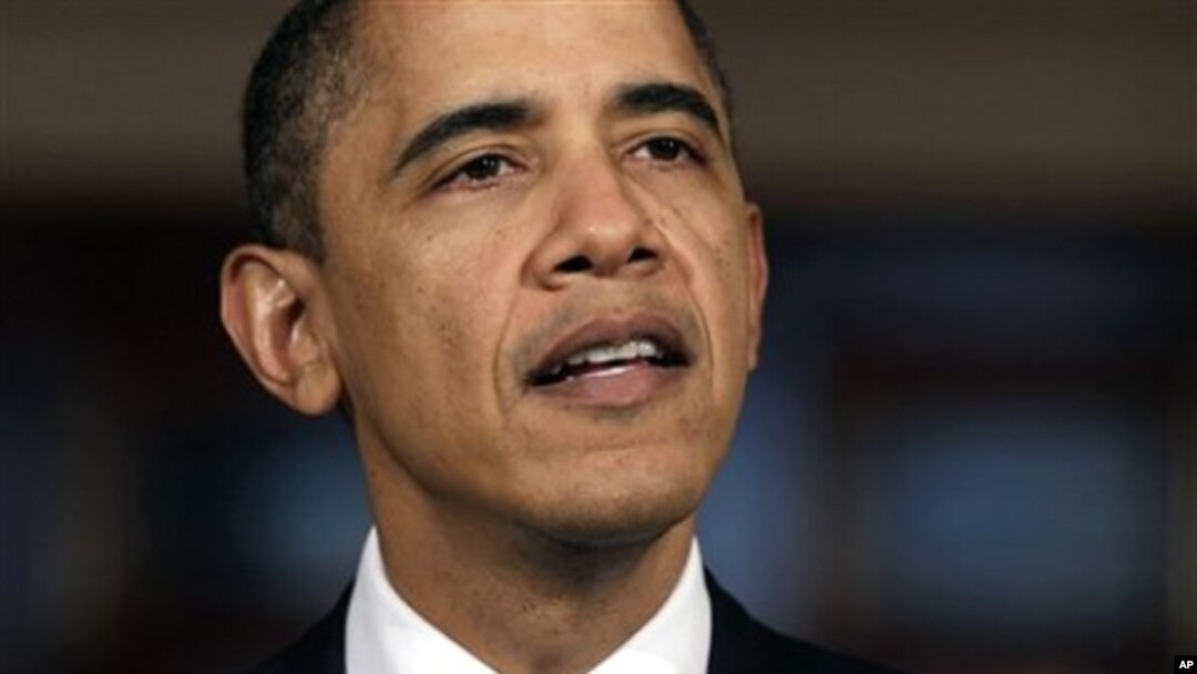 President Barack Obama speaks about the situation in Libya in the Grand Foyer of the White House, February 23, 2011, in Washington.