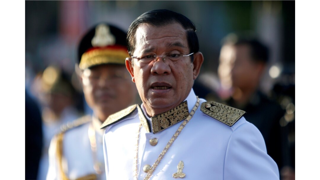 FILE - Cambodia's Prime Minister Hun Sen arrives at the Independence Monument to attend celebrations marking the 65th anniversary of the country's independence from France, in Phnom Penh, Cambodia, Nov. 9, 2018.