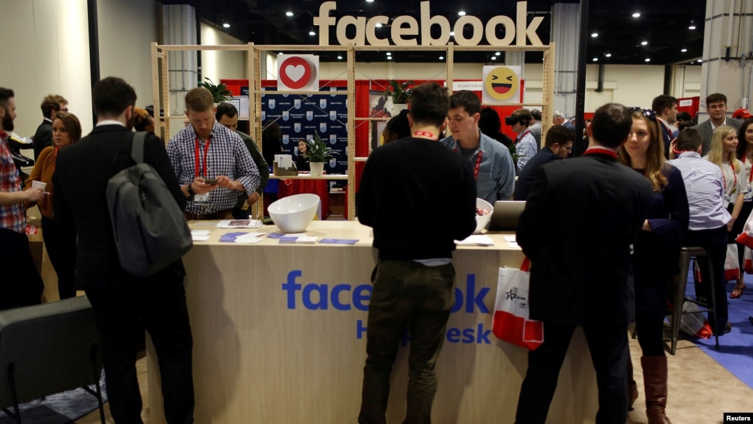 vFILE - People stop at the Facebook booth at the Conservative Political Action Conference (CPAC) at National Harbor, Maryland, U.S., Feb. 23, 2018. 