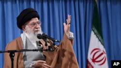 FILE - In this picture released by an official website of the office of the Iranian supreme leader, Ayatollah Ali Khamenei speaks at a meeting with a group of Revolutionary Guards and their families, in Tehran, Iran, April 9, 2019.