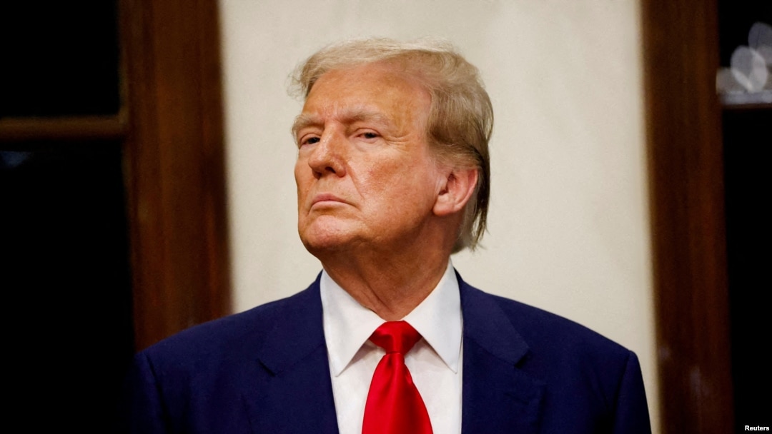 FILE - Republican presidential candidate and former U.S. President Donald Trump at his Trump International Golf Club in West Palm Beach on March 24, 2024.