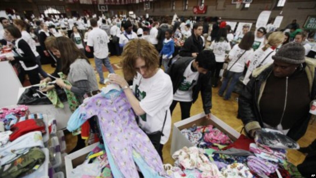 Volunteers for The Salvation Army sort children's pajamas for donation at a Greater Philadelphia Martin Luther King Day of Service event at Girard College in Philadelphia, January 17, 2011.
