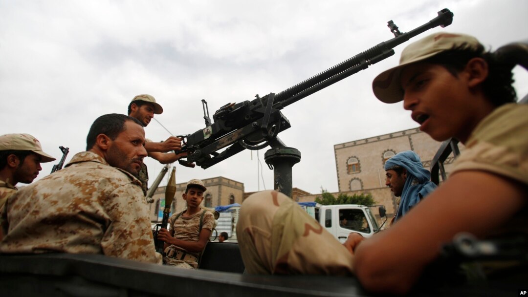 Shi'ite fighters known as Houthis wearing army uniforms ride in a pickup while patrolling in a street in Sana'a, Yemen, July 24, 2015.